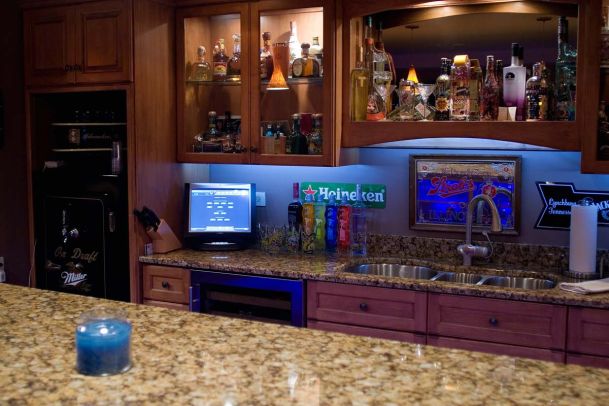 LED lighting in bar area with smart home touchscreen